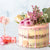 Full flower bouquet semi-naked drip cake